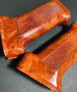 Bright orange polish bakelite grip